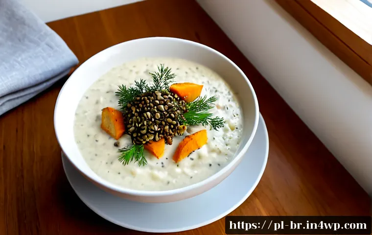 Home 14 알레르기 대체 식품으로 만든 스프 레시피 - Photorealistic creamy dairy-free cauliflower and potato soup in a simple white ceramic bowl, topped ...
